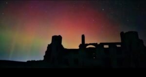 Aurora over Slains Castle