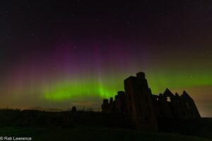 Aurora over Slains Castle