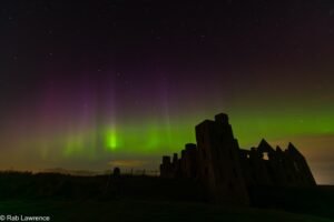 Aurora over Slains Castle